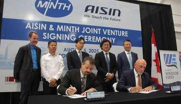 An agreement is signed between Minth and AISIN, August 5, 2025. (Photo by Maureen Revait) 