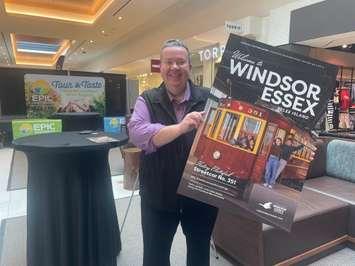 TWEPI CEO Gordon Orr unveils the new Windsor Essex Pelee Island travel guide, April 25, 2025. (Photo by Maureen Revait)